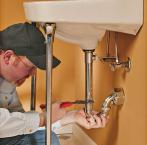 Boulder plumbing contractor repairs a sink